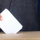 Voter casts a ballot