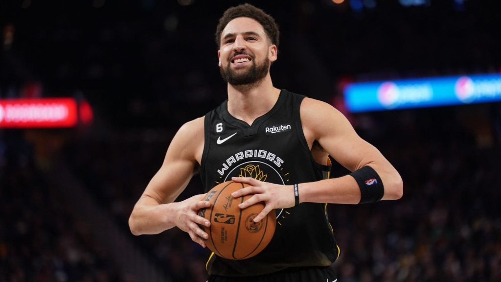 Jan 10, 2023; San Francisco, California, USA; Golden State Warriors guard Klay Thompson (11) holds onto the ball after being called for a foul against the Phoenix Suns in the third quarter at the Chase Center. Mandatory Credit: Cary Edmondson-USA TODAY Sports